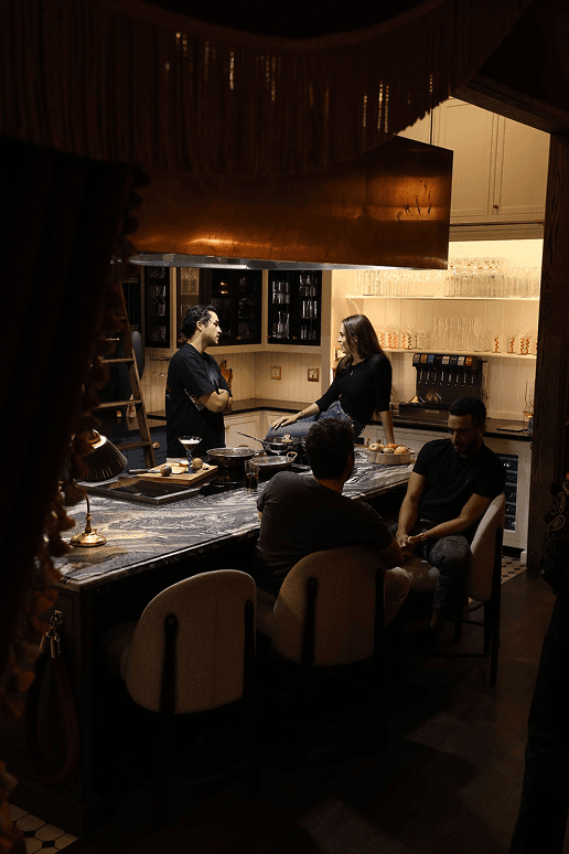 Members gathered in the Maxwell kitchen